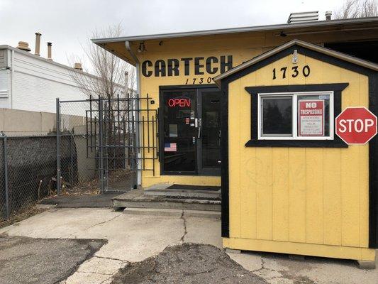 Don't be confused with the place next door! Look for the yellow building.