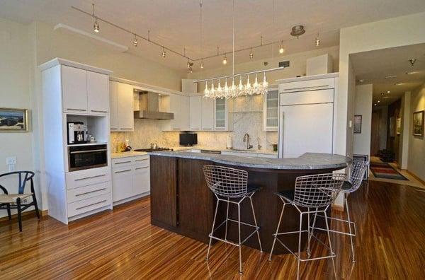 Completely new kitchen layout, cabinets, counters and appliances. The new marble backsplash creates a beautiful background fo...