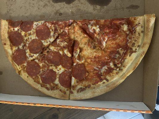 We waited a pretty long time for our pizza at the store and came home to this.... Upsetting