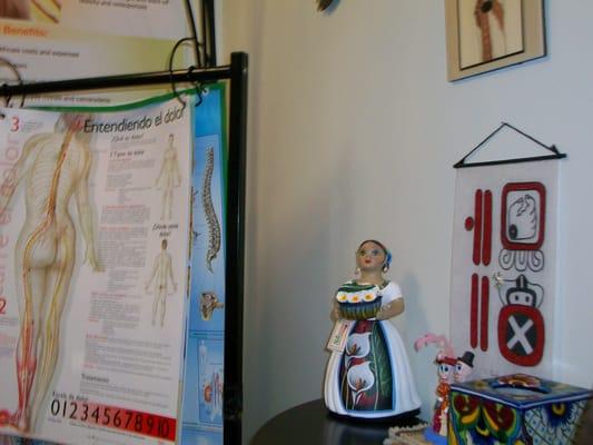 Love the Hispanic folk art doll and bi-cultural feel of the office.