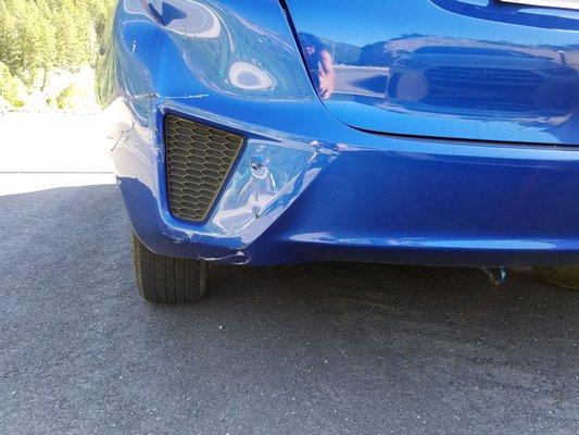 This was the damage of being rear ended at a stop sign.