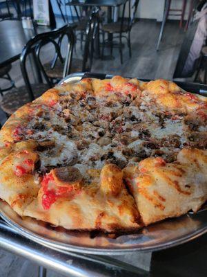 Sausage & Mushroom with a think crust. Yummy!!