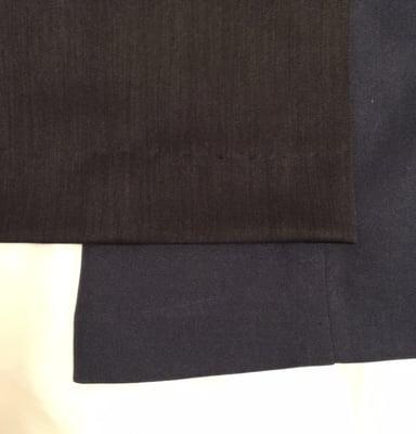 Black pants (bad hem) done by Maria's. You can see wide staggered stitching on the outside of pant. Blue pants completed by a diff tailor.