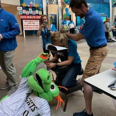 Chair massages at Duke Energy Health Fair event