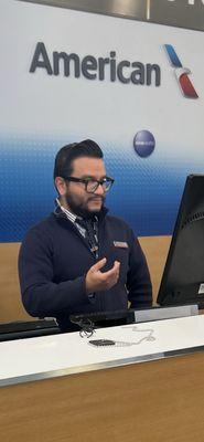 This American Airlines Agent named Jamie verbally threatened me. It was very early and he was RUDE, unaccommodating