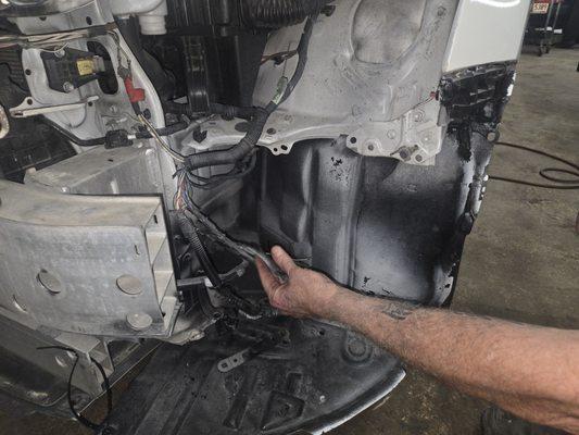 Broken wire harness all of this was found trying to see why headlight was not working