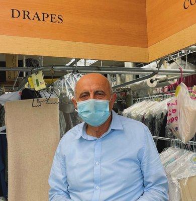 Thrifty Clean's owner, Moez. He opened Thrifty Clean in 1980 and has been running it ever since.