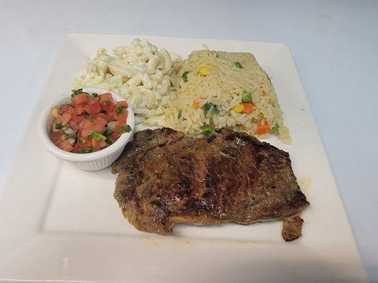 Grilled steak. Rice pasta salad and chimol