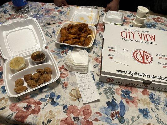 Boneless Bites with sauce on the side, Buffalo Wings, Large Pizza