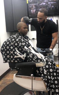 Ray giving my son a tight cut!