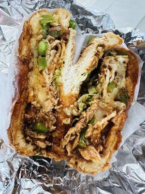 BBQ Chicken, Grilled Peppers & Onions, Pepper Jack Cheese, & Lettuce on a roll