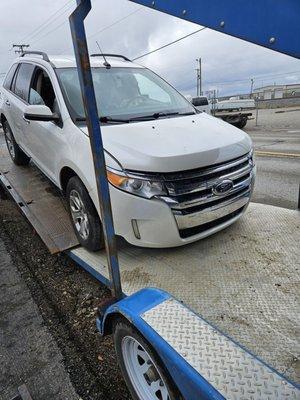 My husband picking it up from dealership