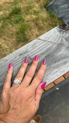 Custom hot pink nails with stripes and rhinestones
