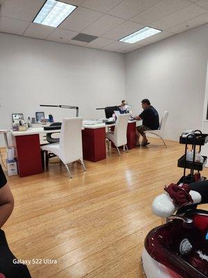 My husband getting his manicure