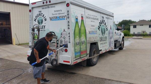 Washing the truck to look nice when it shows up at your front door!