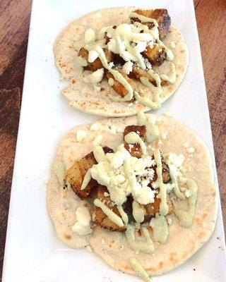 Pork belly taco with poblano cream