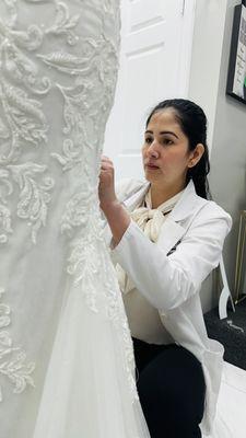 Working in Wedding Gown bustle .