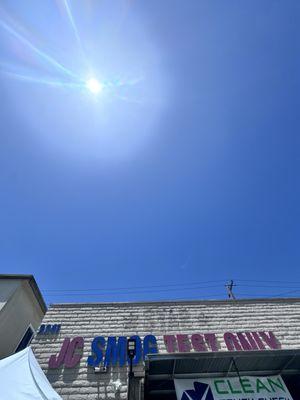 Smog test shop and has a tent to stay out of the sun!