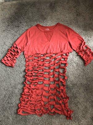 This is made from a T-Shirt. Color of your choice.