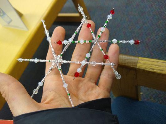 While the teens are in a free bead craft class, I get an hour of peace! My daughter's finished beaded snowflake ornaments.