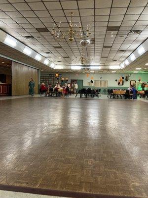 Dance floor in main stage area. Huge and a long bar as well.