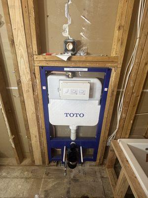 Not a fan of bulky toilets? This toilet tank was installed inside this customer's wall.
