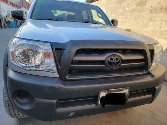 Repaired front bumper & paint job.