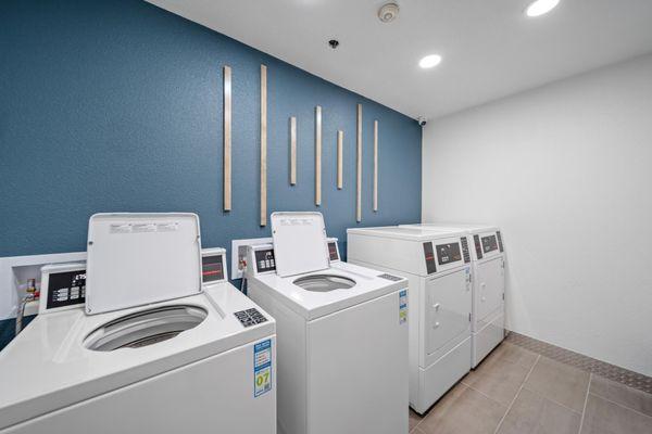 One of the laundry areas - new washers and dryers