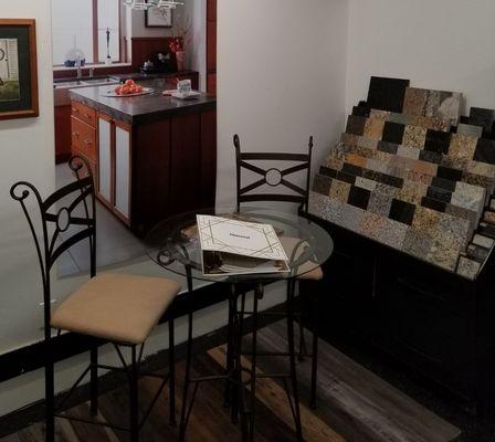 Table where you can relax and take a look at andtake home one of our cabinetry line brochures and catalogs, and granite countertop display