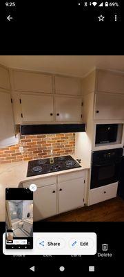 Remodeled kitchen with custom backsplash