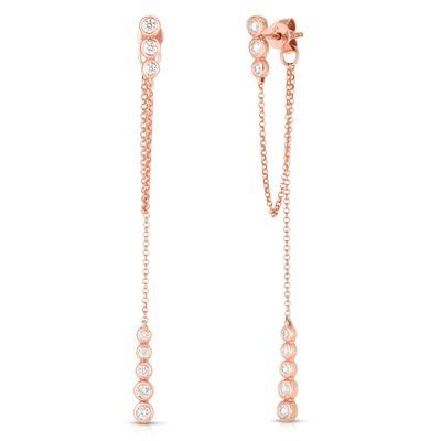 Bezel diamond drop earrings in 14k rose gold.