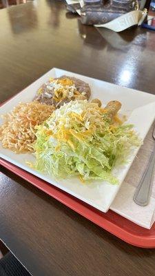 Chicken 1. Two Rolled Tacos, Rice & Beans