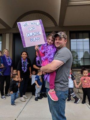 A walkathon organized for one of the preschoolers battling cystic fibrosis. It's really all about support and family here.