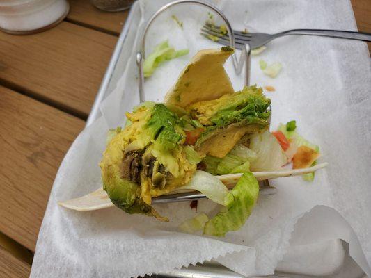 Fish taco with gross old avocado.