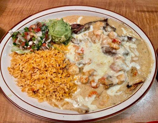 Fajitas Marino - chicken and beef fajitas with a shrimp and crawfish cream sauce