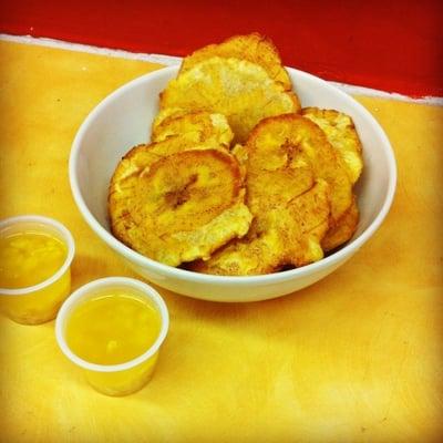 Fried plantains with garlic and oil sauce