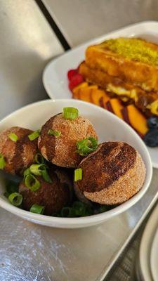 Tikka tots!!! Mashed potatoes rolled in a light spice and fried gently - served with tamarind sauce and saffron yoghurt- so good!