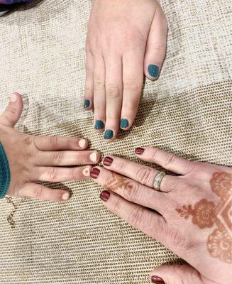 Dark red was gel and the other 2 were normal nail polish. My youngest got a red heart painted on.