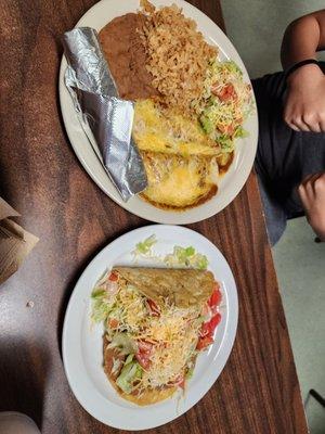 Mexican plate: cheese enchiladas, tostada, crispy taco, rice and beans with a flour tortilla