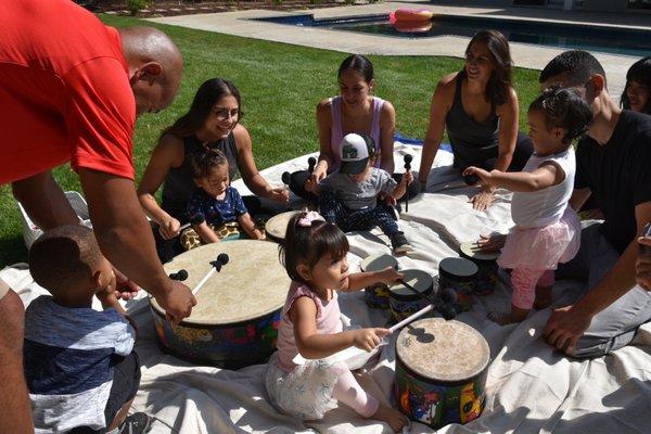 Learning rhythm, movement and language through music.