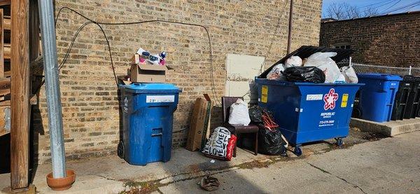 Three used to be two large receptacles. Once Block Property Group took over. This is what they provide for tenants with 24 units