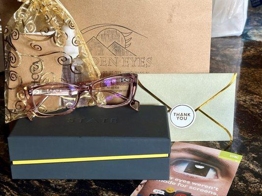 Prescription glasses and goodie bag upon pickup