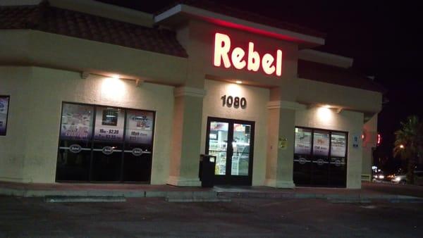 Rebel petro (gas) station building (at night).