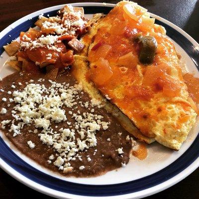 Guayin! 2 egg omelette filled with creamy refried beans and spicy Mexican chorizo topped with our zesty salsa ranchera!