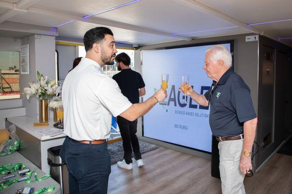 Greeting clients aboard the super yacht day cruise Executive retreat on the Pacific.
