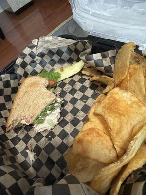 What's left of my tuna sandwich, house fries, and a pickle