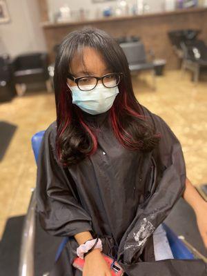 Face framing magenta highlights