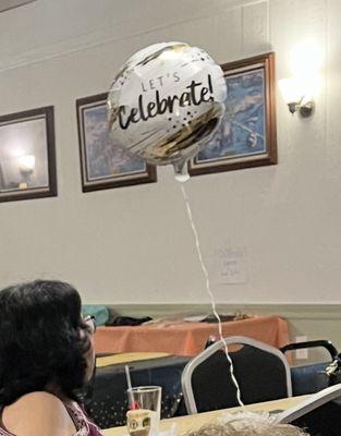 A "Let's Celebrate" balloon! And the party colors were gold & black so this was PERFECT!!