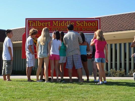 checking the lists to find homeroom teachers at Summer's end