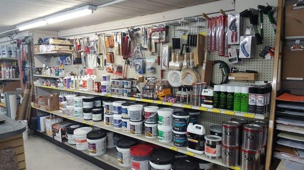 Big selection of flooring tools, adhesives and other supplies.